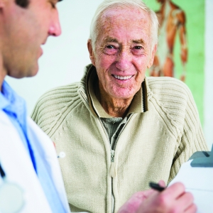 Smiling Older Man in Doctor's Office