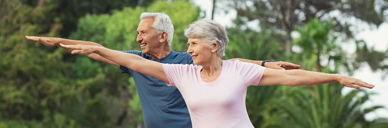 Senior couple doing yoga