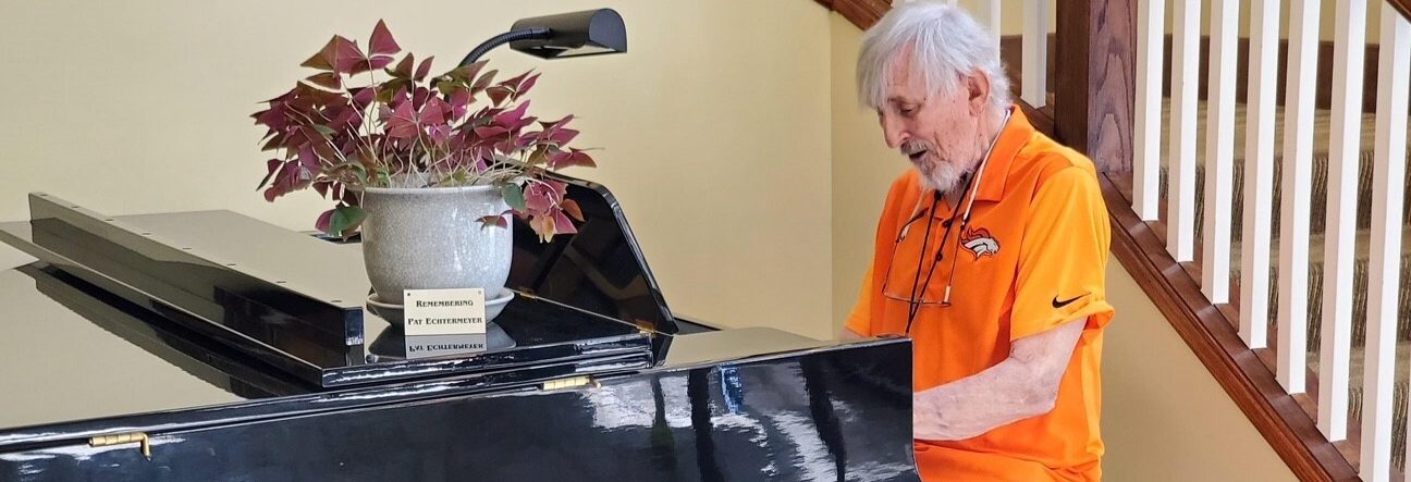 Senior man playing piano