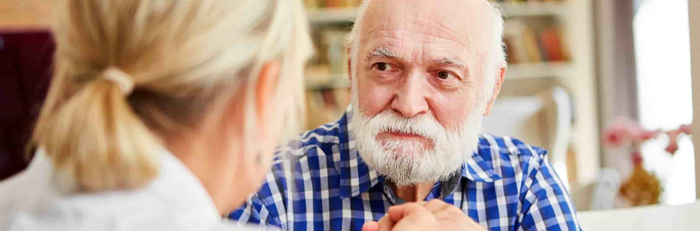 senior man with his nurse