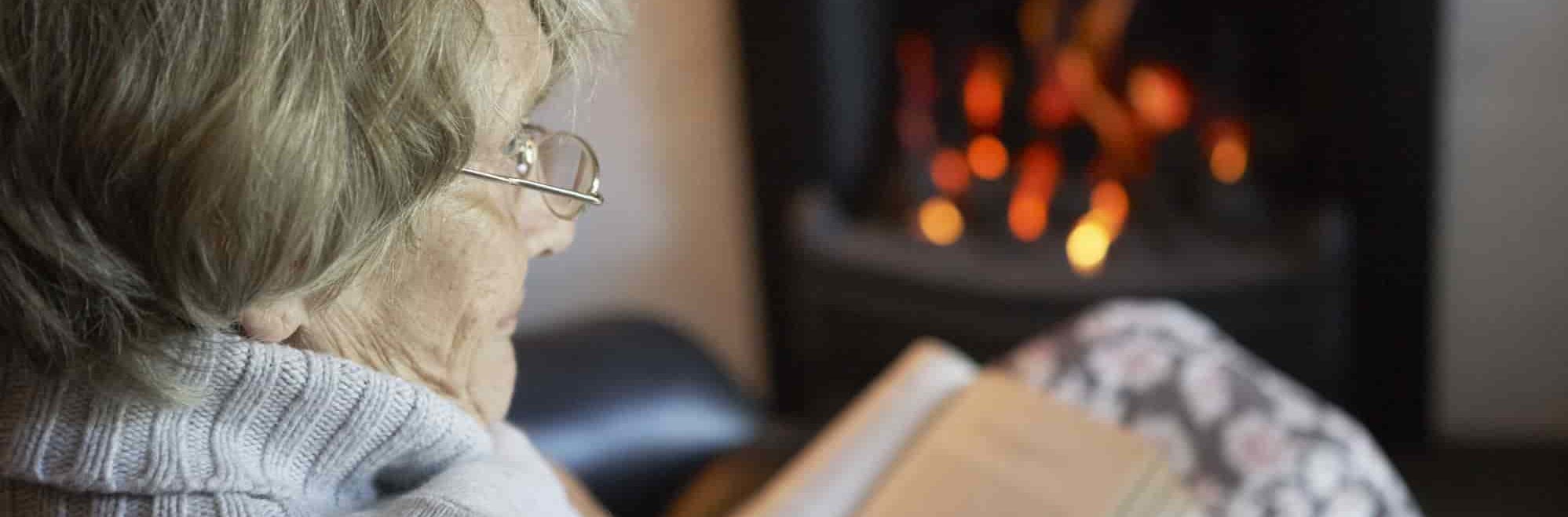 elderly woman reading