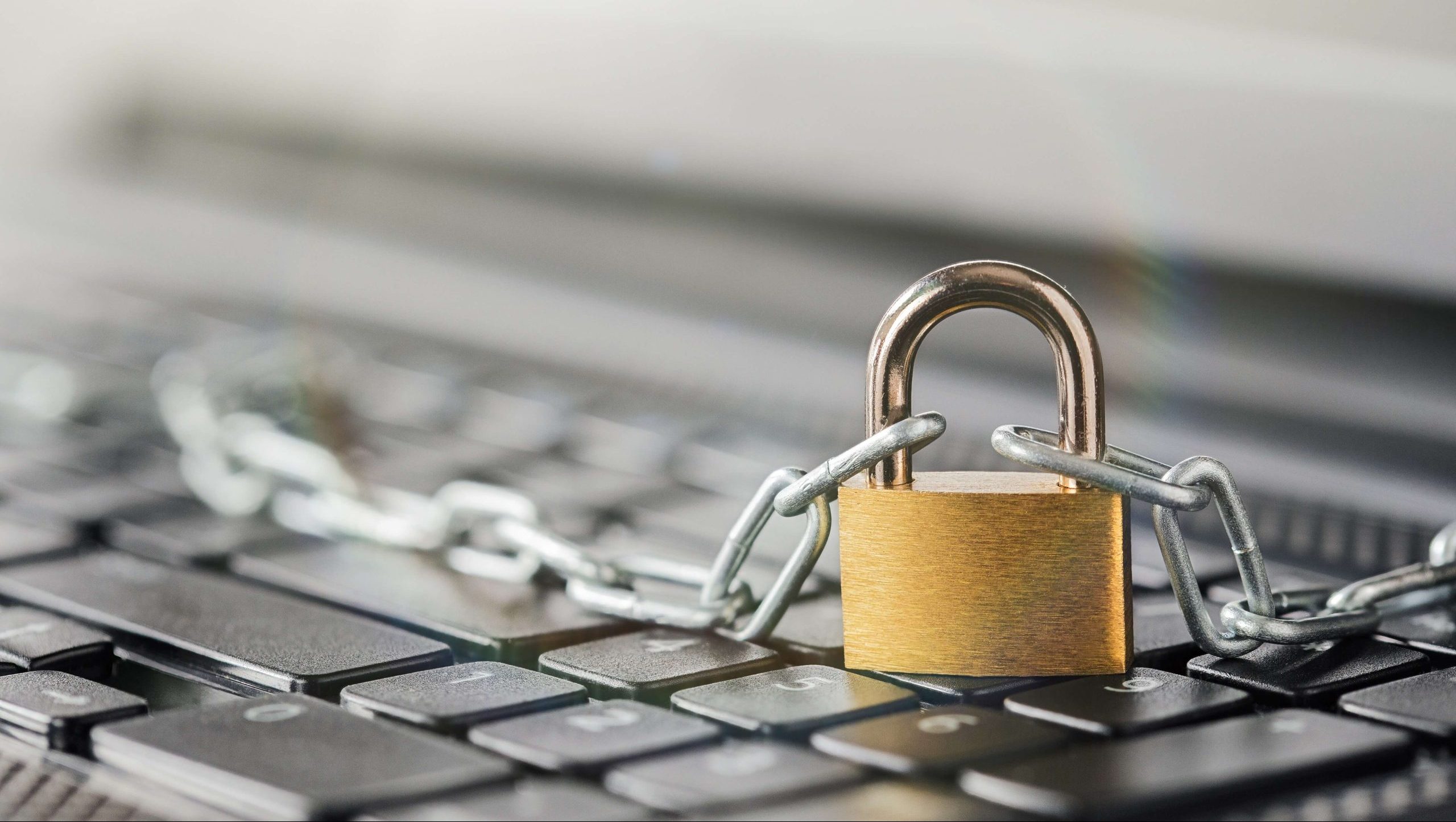 Locked padlock on a laptop keyboard