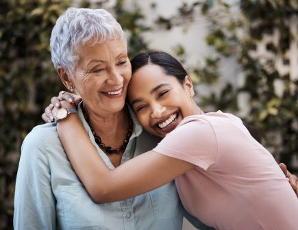 Shot of a senior woman spending time with her daughter in their garden at home Shot of a senior woman spending time with her daughter in their garden at home